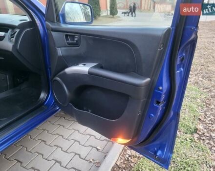 Синий Киа Sportage, объемом двигателя 1.98 л и пробегом 258 тыс. км за 7400 $, фото 83 на Automoto.ua