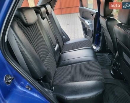 Синий Киа Sportage, объемом двигателя 1.98 л и пробегом 258 тыс. км за 7400 $, фото 88 на Automoto.ua