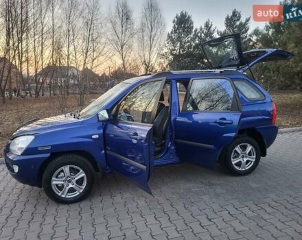 Синий Киа Sportage, объемом двигателя 1.98 л и пробегом 258 тыс. км за 7400 $, фото 64 на Automoto.ua