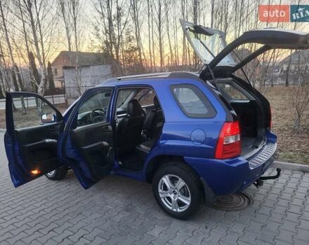 Синий Киа Sportage, объемом двигателя 1.98 л и пробегом 258 тыс. км за 7400 $, фото 68 на Automoto.ua