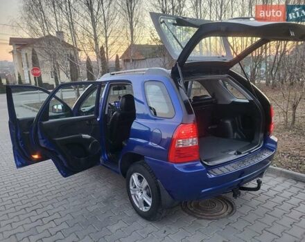 Синий Киа Sportage, объемом двигателя 1.98 л и пробегом 258 тыс. км за 7400 $, фото 57 на Automoto.ua