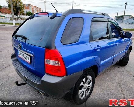 Синій Кіа Sportage, об'ємом двигуна 2 л та пробігом 250 тис. км за 7900 $, фото 4 на Automoto.ua