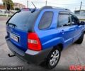 Синій Кіа Sportage, об'ємом двигуна 2 л та пробігом 250 тис. км за 7900 $, фото 4 на Automoto.ua