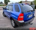 Синій Кіа Sportage, об'ємом двигуна 2 л та пробігом 250 тис. км за 7900 $, фото 3 на Automoto.ua