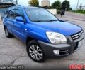 Синій Кіа Sportage, об'ємом двигуна 2 л та пробігом 250 тис. км за 7900 $, фото 1 на Automoto.ua