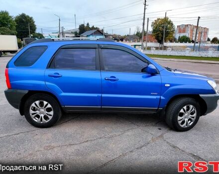 Синій Кіа Sportage, об'ємом двигуна 2 л та пробігом 250 тис. км за 7900 $, фото 1 на Automoto.ua