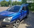 Синий Киа Sportage, объемом двигателя 2 л и пробегом 182 тыс. км за 8600 $, фото 1 на Automoto.ua