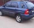 Синий Киа Sportage, объемом двигателя 1.98 л и пробегом 88 тыс. км за 10000 $, фото 3 на Automoto.ua