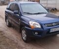 Синий Киа Sportage, объемом двигателя 1.98 л и пробегом 88 тыс. км за 10000 $, фото 2 на Automoto.ua