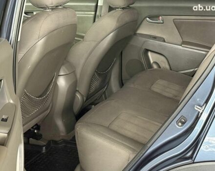 Синий Киа Sportage, объемом двигателя 2.4 л и пробегом 305 тыс. км за 11440 $, фото 14 на Automoto.ua