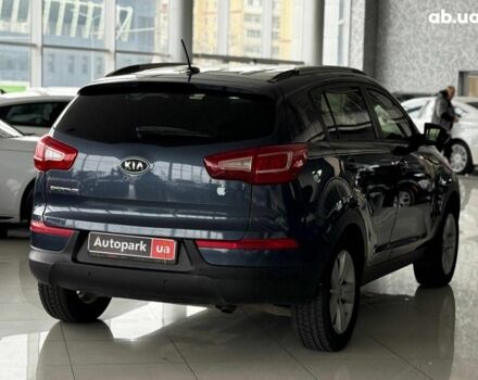 Синий Киа Sportage, объемом двигателя 2.4 л и пробегом 305 тыс. км за 11440 $, фото 6 на Automoto.ua