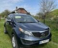 Синій Кіа Sportage, об'ємом двигуна 2.4 л та пробігом 273 тис. км за 10990 $, фото 2 на Automoto.ua