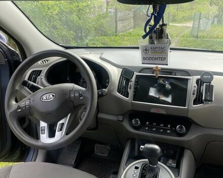 Синій Кіа Sportage, об'ємом двигуна 2.4 л та пробігом 273 тис. км за 10990 $, фото 12 на Automoto.ua