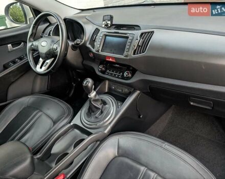 Синий Киа Sportage, объемом двигателя 2 л и пробегом 112 тыс. км за 13000 $, фото 20 на Automoto.ua