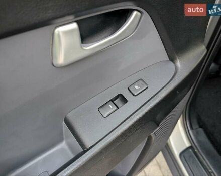 Синий Киа Sportage, объемом двигателя 2 л и пробегом 112 тыс. км за 13000 $, фото 18 на Automoto.ua