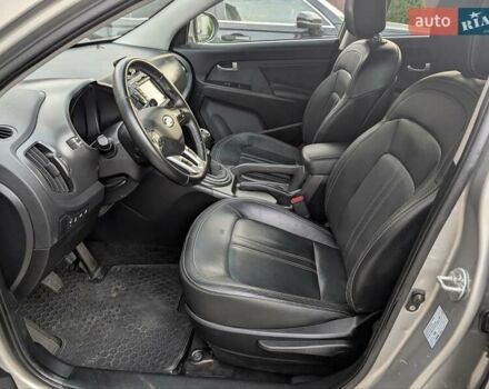 Синий Киа Sportage, объемом двигателя 2 л и пробегом 112 тыс. км за 13000 $, фото 19 на Automoto.ua