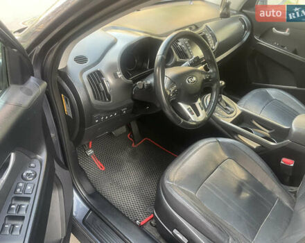 Синий Киа Sportage, объемом двигателя 2.4 л и пробегом 280 тыс. км за 12000 $, фото 13 на Automoto.ua
