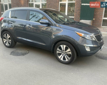 Синий Киа Sportage, объемом двигателя 2.4 л и пробегом 280 тыс. км за 12000 $, фото 6 на Automoto.ua