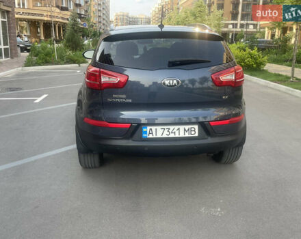 Синий Киа Sportage, объемом двигателя 2.4 л и пробегом 280 тыс. км за 12000 $, фото 4 на Automoto.ua