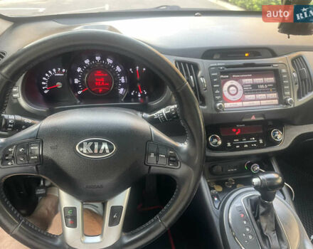 Синий Киа Sportage, объемом двигателя 2.4 л и пробегом 280 тыс. км за 12000 $, фото 15 на Automoto.ua