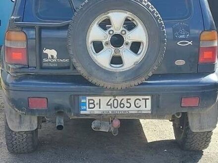 Синій Кіа Sportage, об'ємом двигуна 2 л та пробігом 400 тис. км за 4000 $, фото 1 на Automoto.ua