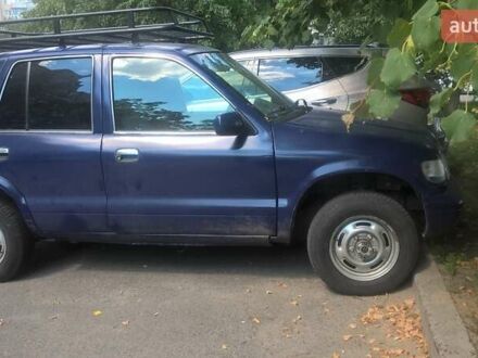 Синій Кіа Sportage, об'ємом двигуна 2 л та пробігом 330 тис. км за 3999 $, фото 1 на Automoto.ua