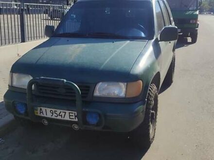 Синий Киа Sportage, объемом двигателя 2 л и пробегом 419 тыс. км за 3836 $, фото 1 на Automoto.ua