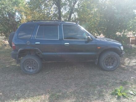 Синий Киа Sportage, объемом двигателя 2 л и пробегом 28 тыс. км за 2500 $, фото 1 на Automoto.ua