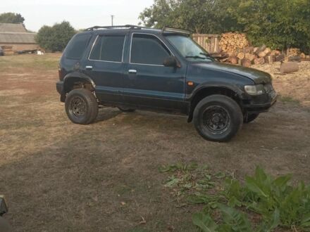 Синий Киа Sportage, объемом двигателя 2 л и пробегом 1 тыс. км за 2200 $, фото 1 на Automoto.ua