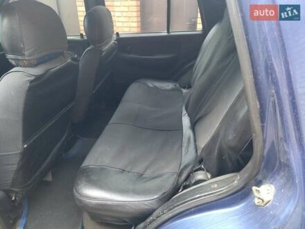 Синій Кіа Sportage, об'ємом двигуна 2 л та пробігом 200 тис. км за 3100 $, фото 1 на Automoto.ua