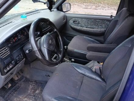 Синий Киа Sportage, объемом двигателя 2 л и пробегом 210 тыс. км за 3300 $, фото 1 на Automoto.ua