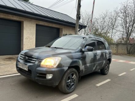 Синий Киа Sportage, объемом двигателя 2 л и пробегом 200 тыс. км за 4300 $, фото 1 на Automoto.ua
