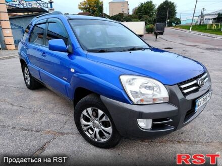 Синій Кіа Sportage, об'ємом двигуна 2 л та пробігом 250 тис. км за 7900 $, фото 1 на Automoto.ua