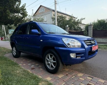 Синий Киа Sportage, объемом двигателя 2 л и пробегом 232 тыс. км за 8223 $, фото 1 на Automoto.ua