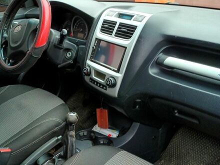 Синий Киа Sportage, объемом двигателя 2 л и пробегом 225 тыс. км за 7800 $, фото 1 на Automoto.ua