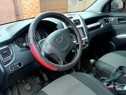 Синий Киа Sportage, объемом двигателя 2 л и пробегом 225 тыс. км за 7800 $, фото 1 на Automoto.ua