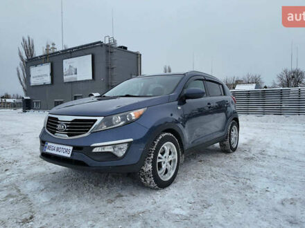 Синій Кіа Sportage, об'ємом двигуна 2.4 л та пробігом 145 тис. км за 11990 $, фото 1 на Automoto.ua