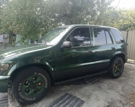 Зеленый Киа Sportage, объемом двигателя 2 л и пробегом 327 тыс. км за 3400 $, фото 1 на Automoto.ua