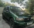 Зеленый Киа Sportage, объемом двигателя 2 л и пробегом 327 тыс. км за 3400 $, фото 1 на Automoto.ua