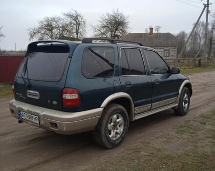 Зеленый Киа Sportage, объемом двигателя 2 л и пробегом 315 тыс. км за 3077 $, фото 1 на Automoto.ua