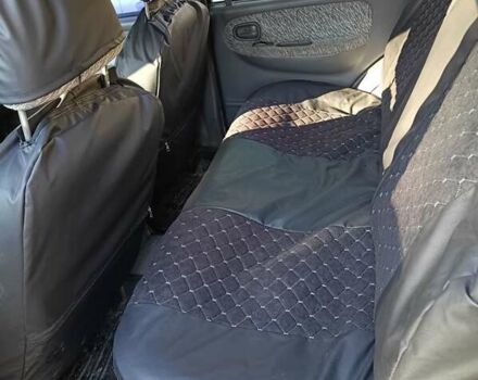 Зеленый Киа Sportage, объемом двигателя 2 л и пробегом 365 тыс. км за 4000 $, фото 10 на Automoto.ua