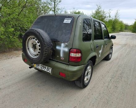 Зелений Кіа Sportage, об'ємом двигуна 2 л та пробігом 137 тис. км за 2800 $, фото 6 на Automoto.ua