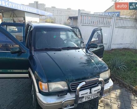 Зеленый Киа Sportage, объемом двигателя 2 л и пробегом 365 тыс. км за 4000 $, фото 4 на Automoto.ua