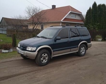 Зеленый Киа Sportage, объемом двигателя 2 л и пробегом 315 тыс. км за 3077 $, фото 4 на Automoto.ua