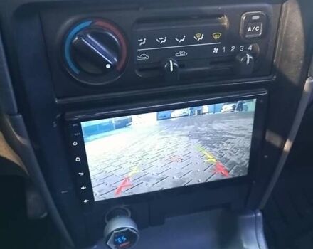 Зеленый Киа Sportage, объемом двигателя 2 л и пробегом 365 тыс. км за 4000 $, фото 11 на Automoto.ua