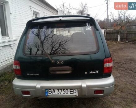 Зелений Кіа Sportage, об'ємом двигуна 2 л та пробігом 198 тис. км за 3900 $, фото 4 на Automoto.ua