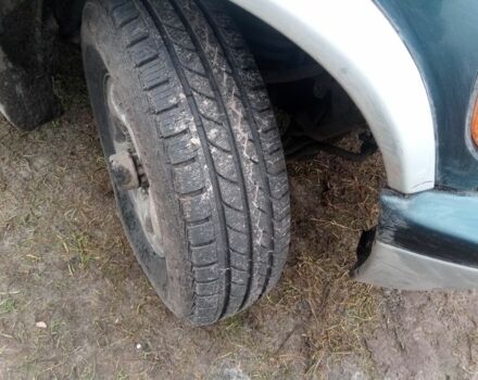 Зеленый Киа Sportage, объемом двигателя 2 л и пробегом 198 тыс. км за 3900 $, фото 3 на Automoto.ua