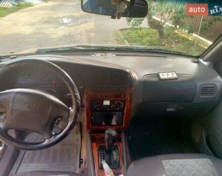 Зелений Кіа Sportage, об'ємом двигуна 2 л та пробігом 230 тис. км за 4500 $, фото 6 на Automoto.ua