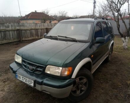 Зелений Кіа Sportage, об'ємом двигуна 2 л та пробігом 198 тис. км за 3900 $, фото 1 на Automoto.ua