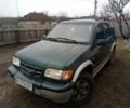 Зеленый Киа Sportage, объемом двигателя 2 л и пробегом 198 тыс. км за 3900 $, фото 1 на Automoto.ua